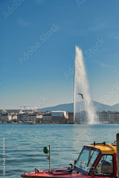 Fototapeta bateau taxi de la rade de Genève devant le jet d'eau