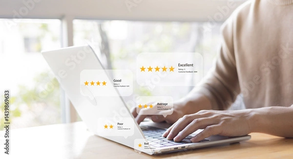 Fototapeta close up man use laptop to heck score and read review online website page about service and experience with many feedback and ranking score from customer for business quality and evaluation concept