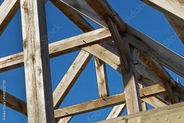 Fototapeta Oak wood condstruction of a house or barn. Architecture. Craft.