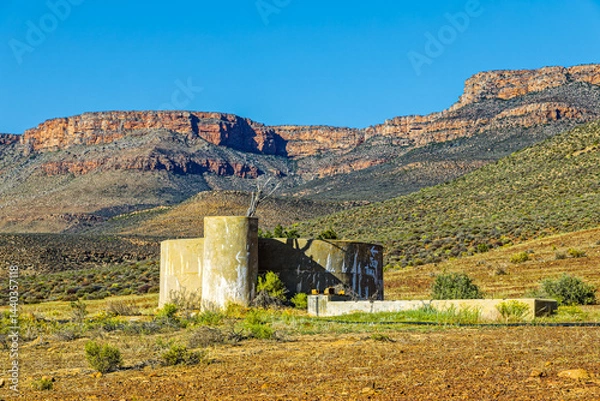 Obraz Abandoned water storage tank in mountains