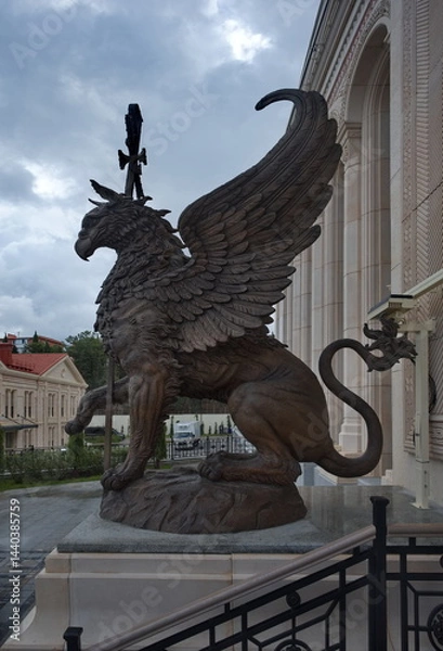 Fototapeta Sevastopol, Russia. October 07, 2024. Bronze sculpture of a griffin at the main entrance to the Museum of Christianity, located in the museum and temple complex Novy Chersonesos.