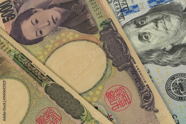 Obraz Japanese Yen and US Dollar Banknotes. Cash. Financial Concept.