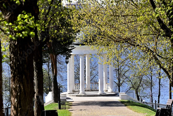 Fototapeta View of A. N. Ostrovsky's gazebo from the alley leading to it on a spring morning