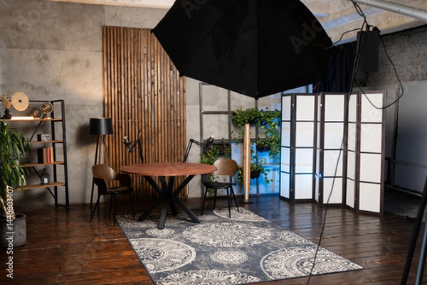 Fototapeta Podcast studio setup featuring microphone and interview space with modern decor and live broadcast equipment