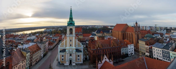 Obraz Panoramic aerial view of Toruń Old Town with Vistula River, historic churches and colorful tenements, Poland