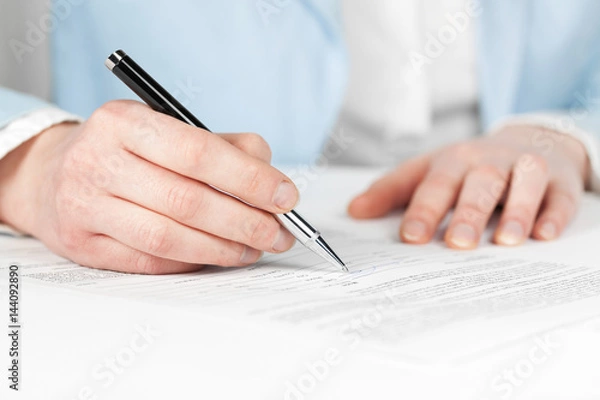 Obraz Business woman signing contract