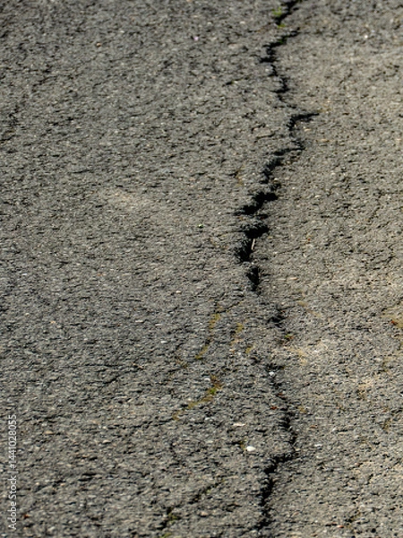 Obraz Risse in der Strassendecke