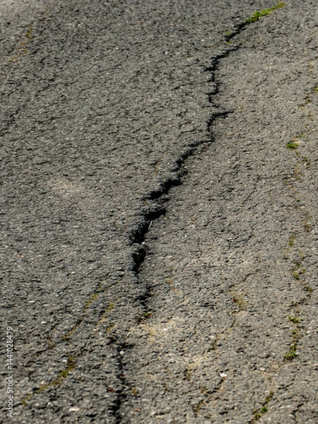 Obraz Risse in der Strassendecke