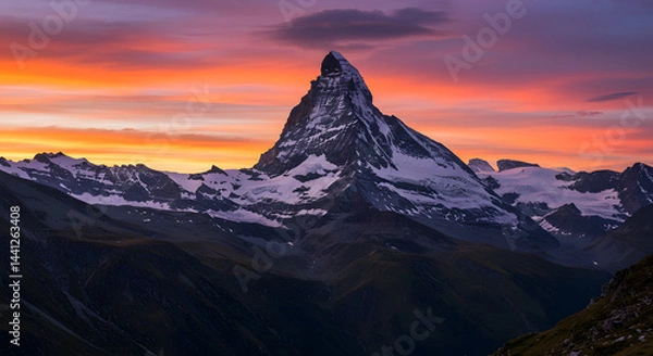 Fototapeta Majestic Matterhorn Peak at Sunrise with Colorful Sky Over Mountain Range