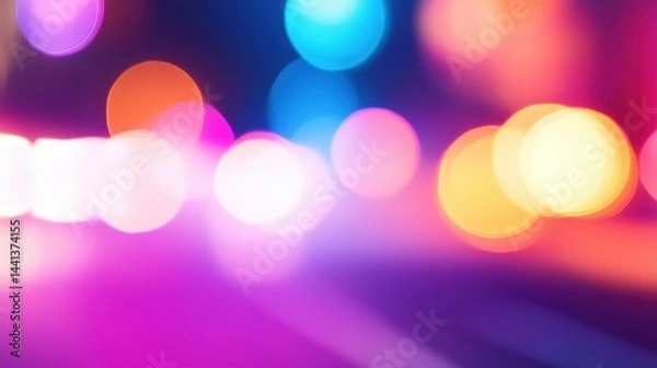 Fototapeta Blurry night scene filled with colorful bokeh lights, creating a vibrant urban atmosphere