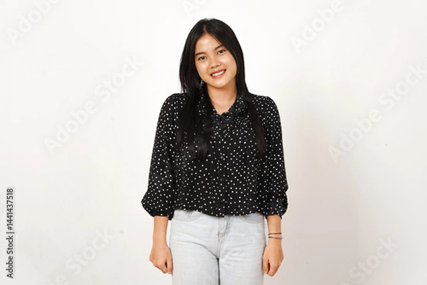 Obraz Smiling and Looking at camera Of Beautiful Asian Woman Wearing black Isolated On White Background
