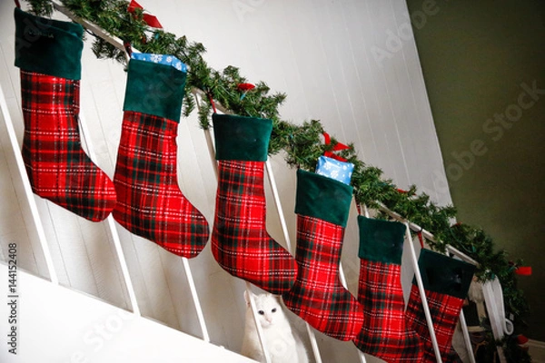 Obraz Holidays: Stockings hanging on staircase