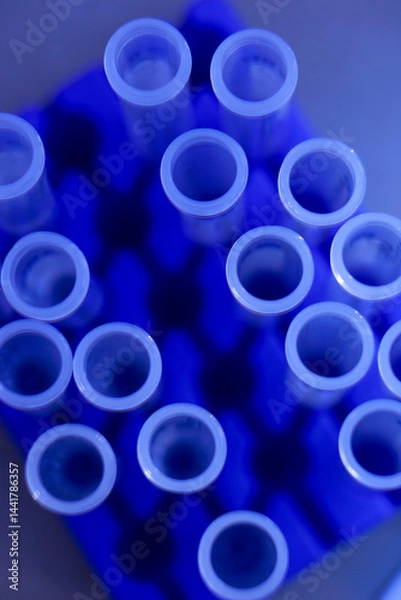 Fototapeta Looking down on biomedical test tubes