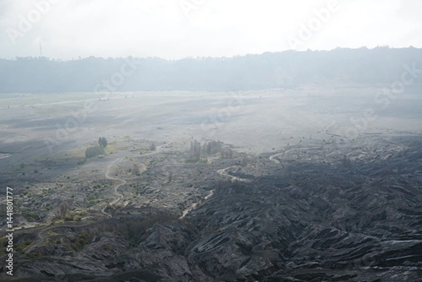 Fototapeta Volcanic eruption aftermath nature reserve aerial view desolate landscape foggy environment environmental impact
