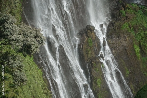 Obraz Cascading waterfall scene lush greenery nature photography tranquil environment aerial view serenity concept