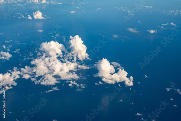 Fototapeta Aerial cloudscaspe picturesque clouds and sky from top view over the horizon