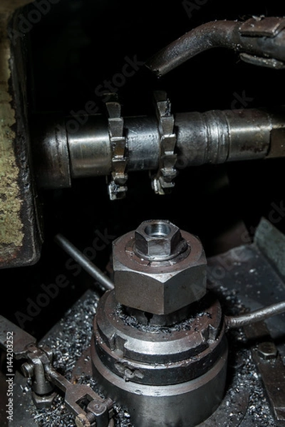 Fototapeta metal working. Process of tooth gear wheel finish machining by cutter tool at factory