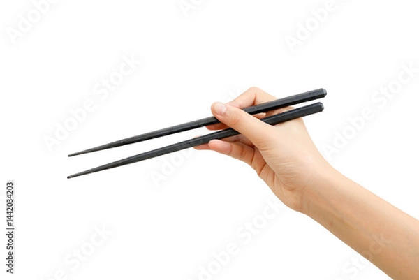 Fototapeta Black chopsticks hand on white background