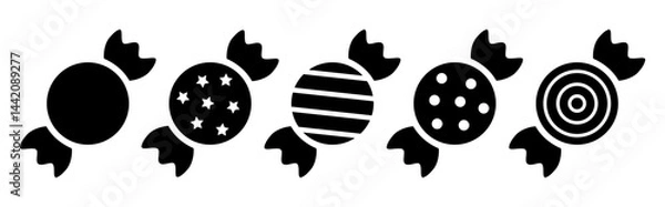 Fototapeta Round wrapped candies icon set, black silhouette isolated on white. Wrapper with stripes, polka dot and stars pattern. Stencil style. Vector and png clipart, sign or logo of minimalist design.