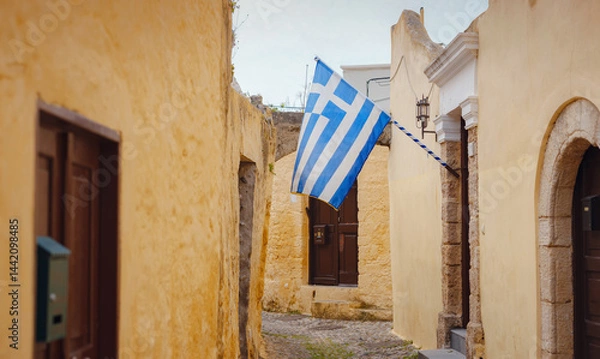 Fototapeta View of Greek flag waving in air serene Mediterranean vibe.