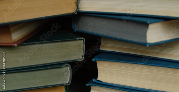 Fototapeta Bunch of books. Widescreen background. Collected works. Selective focus.