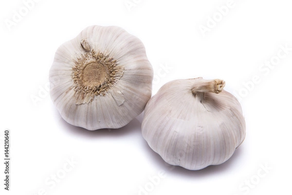 Fototapeta Two garlics isolate on white background