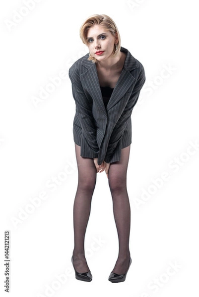 Fototapeta Business lady in a suit with amazing long legs in tights in the studio.