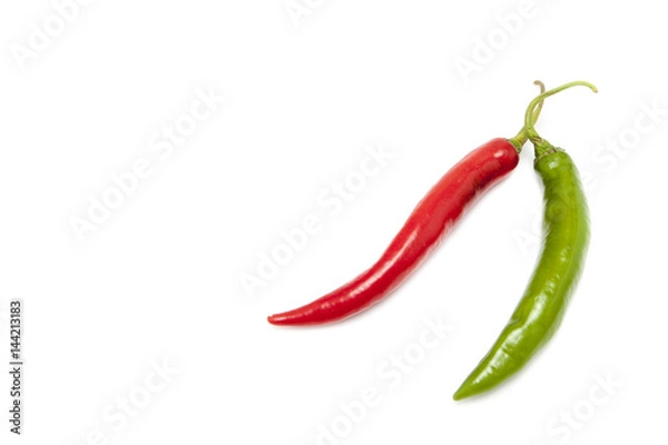 Fototapeta Two chilis and two color on white background