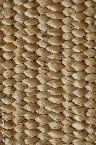 Fototapeta macro texture of summer brown paper hat as background, close up texture of panama hat, paper for panama hat	
