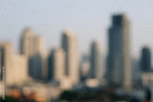 Fototapeta Skyline Silhouette: Abstract cityscape with buildings in a blurred view, offering a tranquil, modern, and minimalist feel.