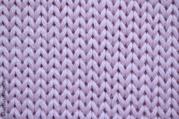 Fototapeta cold pink texture of knitted wool fabric as a background, smooth symmetrical lines of hand-knitted needlework pattern