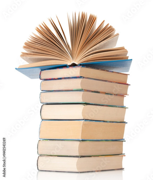 Fototapeta Stack of books close up isolated on a white background