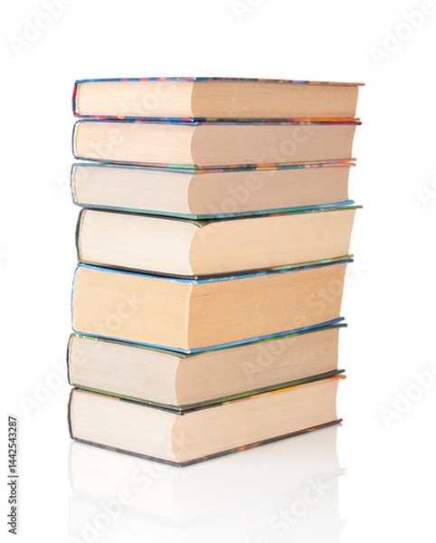 Obraz Stack of books close up isolated on a white background