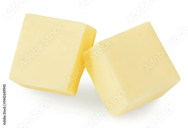 Obraz Butter cube isolated on white background. Fresh cow’s milk butter piece close up. Package design element..