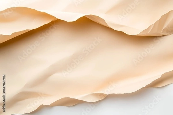 Obraz Soft, pale beige fabric draped with gentle folds, creating a subtle, elegant curve against a white background