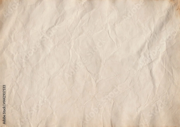 Fototapeta Vintage coffee-stained paper texture with soft wrinkles and aged edges. Perfect for scrapbooking, journaling, invitations, calligraphy, antique projects