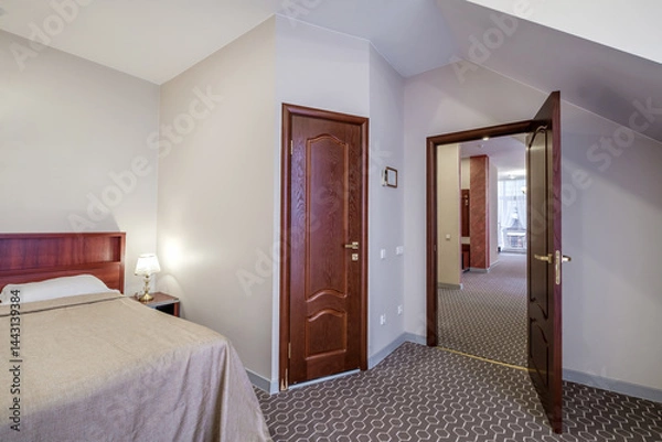 Obraz Interior of modern luxure bedroom in studio apartments with double bed with pillows