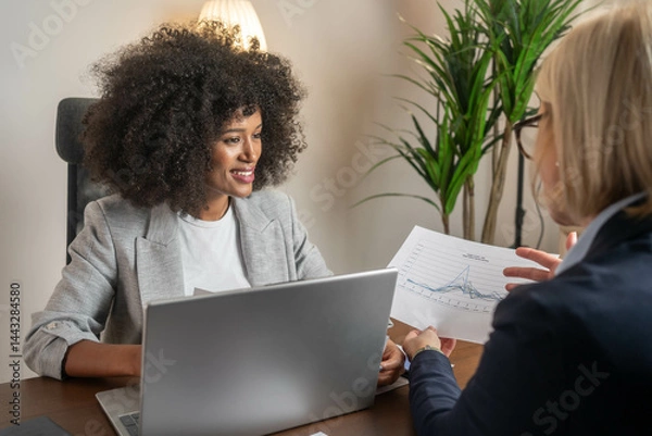 Fototapeta Legal consultancy concept. Business woman lawyer attorney showing document to man client providing advisory services, professionals discussing tax papers working in office at meeting