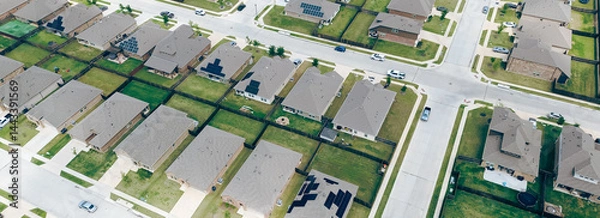 Fototapeta Panorama aerial view spacious backyard grassy lawn of new construction houses in fast growing Princeton, Collin County, Texas, clean energy efficiency home DFW metroplex, upscale residential area