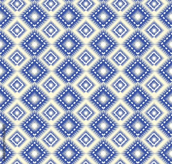 Fototapeta Seamless pattern with geometric diagonal tartan ornament. Tribal Ikat texture in traditional ethnic style. Abstract pattern design for texture, fabric, clothing, decoration.
