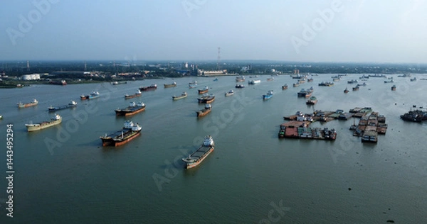 Obraz Aerial view of the lighter ship carrying  goods,oil tanker anchor in the sea port chittagong,Bangladesh. For energy export and import business for transportation