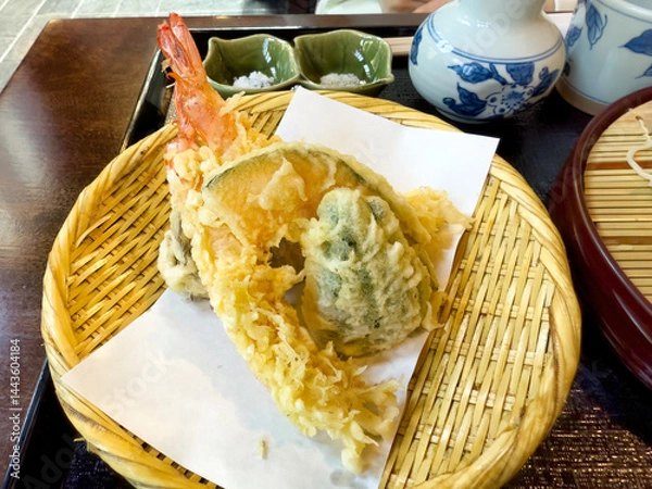Fototapeta Top view of batter fried shrimp and vegetable commonly called Japanese tempura in bamboo dish