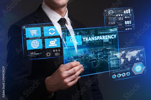 Fototapeta Business, Technology, Internet and network concept. Young businessman working on a virtual screen of the future and sees the inscription: Transparency