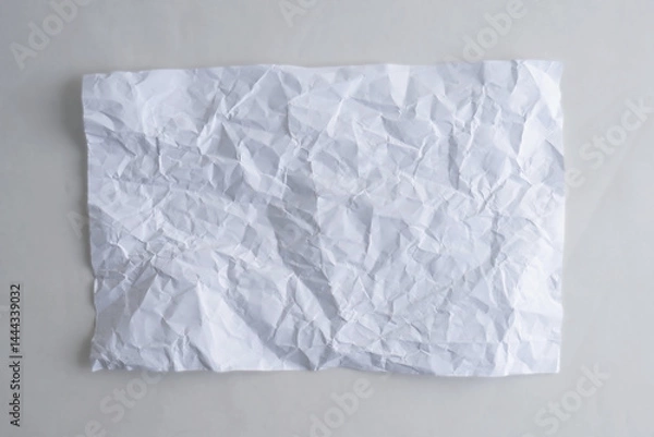 Obraz White Paper Texture background. Crumpled piece of  white paper on white background. Top view.  Copy space for text and design element.