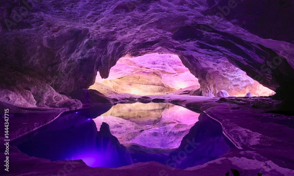 Obraz crystalline cave with glowing amethyst walls and reflective pool at the center Generative AI