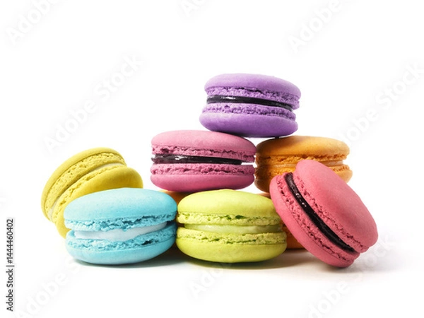 Obraz Pile of macaron cookies in various flavours and colours isolated on white background.
