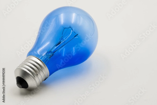 Obraz Unique blue electric light bulb captures attention with its vibrant color and modern design