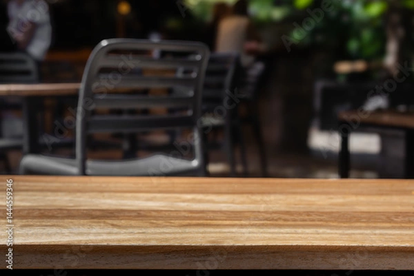 Fototapeta Wooden table copy space empty background mock up. table mock up with blurred cafe background. Wooden tabletop product placement Wooden countertop in restaurant with empty space Wooden table background