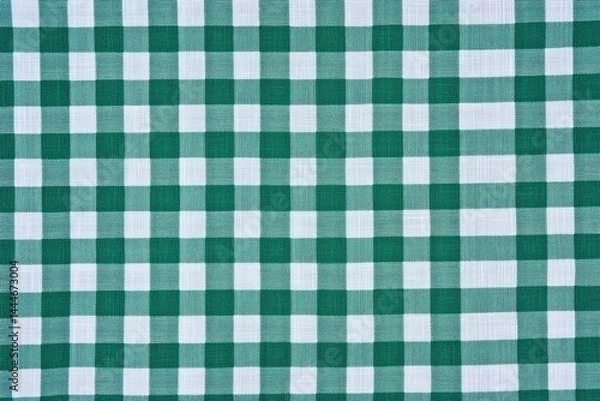 Fototapeta Green and white checkered tablecloth  Close-up view of a textile with a regular pattern of squares