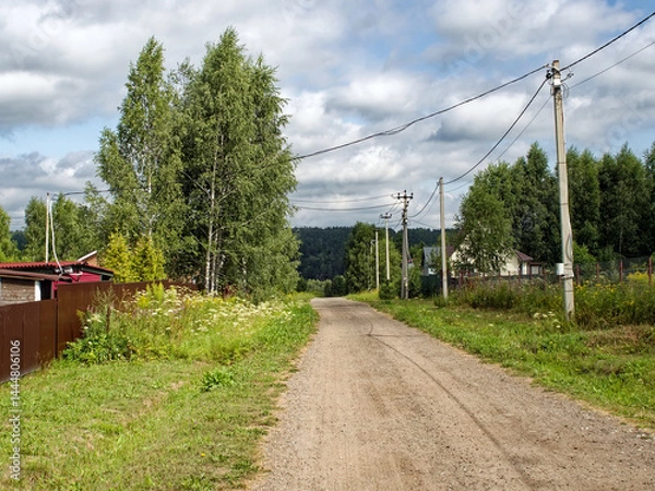 Obraz Dirt road in a holiday village in summer